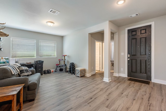 4114 Anglers Way, Royse City, TX 75189 - living area featuring visible vents, wood finished floors, and baseboards
