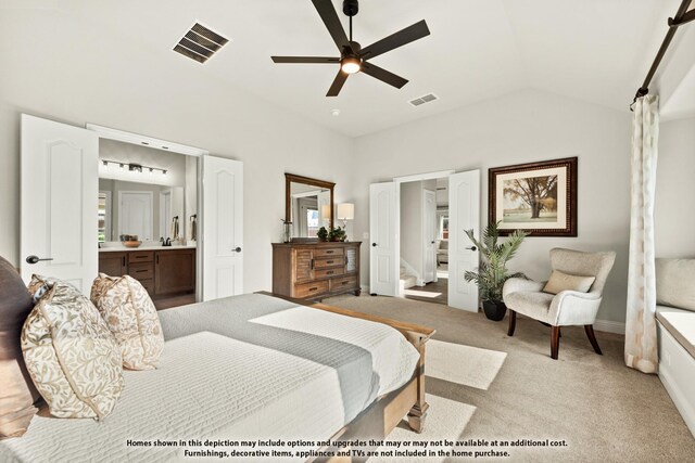 bedroom with lofted ceiling, ensuite bath, visible vents, and light colored carpet