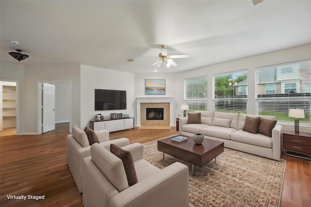1405 Blue Gill Ln, Crowley, TX 76036 - unfurnished living room featuring visible vents, a ceiling fan, light wood finished floors, and stairway