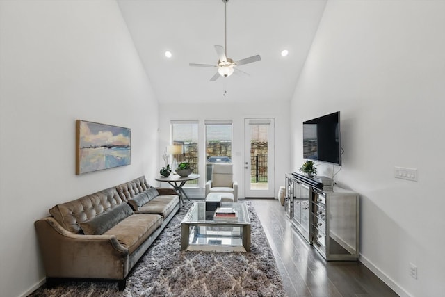 living area with recessed lighting, a ceiling fan, wood finished floors, and baseboards