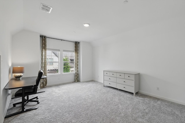 office with visible vents, baseboards, lofted ceiling, and carpet floors