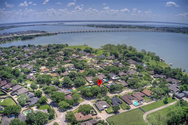 bird's eye view featuring a residential view and a water view