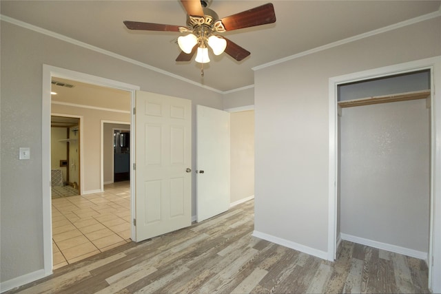 216 S Mesquite St, Muenster, TX 76252 - unfurnished bedroom with visible vents, crown molding, wood finished floors, baseboards, and a ceiling fan