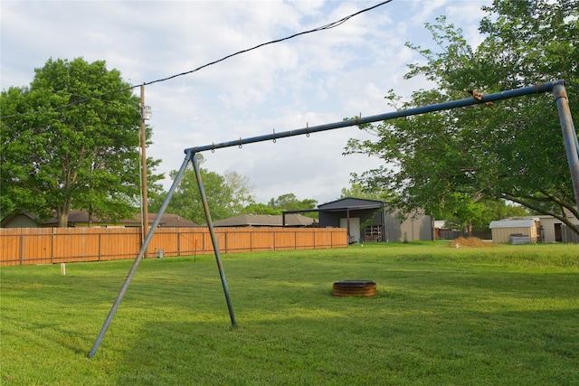 216 S Mesquite St, Muenster, TX 76252 - view of yard with fence and an outbuilding