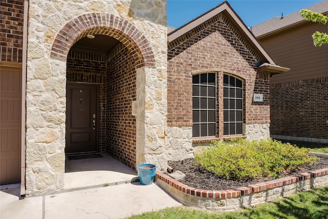 462 Pleasant Hill Ln, Fate, TX 75189 - property entrance featuring brick siding and stone siding
