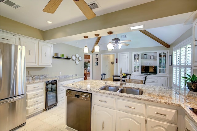 kitchen featuring ceiling fan, visible vents, freestanding refrigerator, dishwasher, and wine cooler