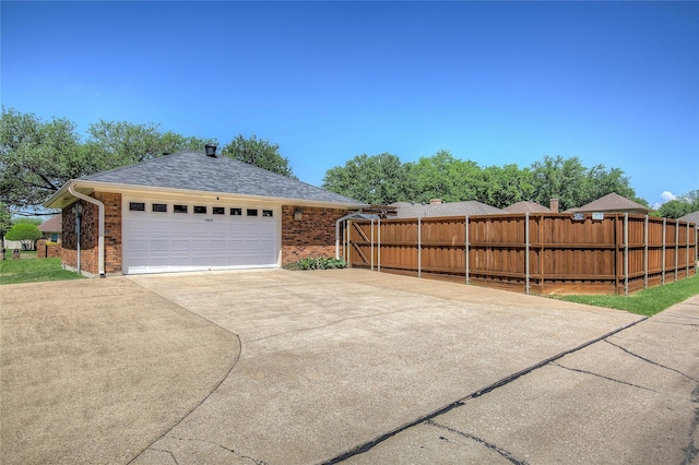 garage with fence