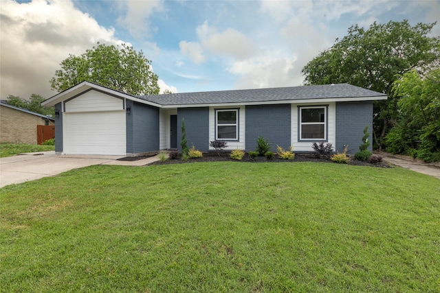 ranch-style house featuring a front lawn, brick siding, driveway, and a garage