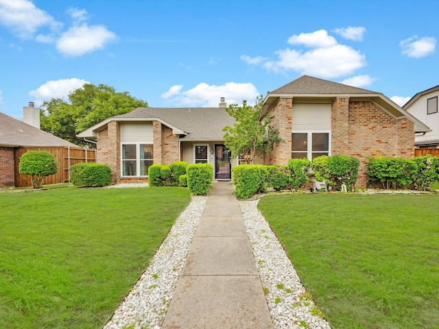 2024 Crestside Dr, Carrollton, TX 75007 - view of front of house with brick siding, roof with shingles, and a chimney