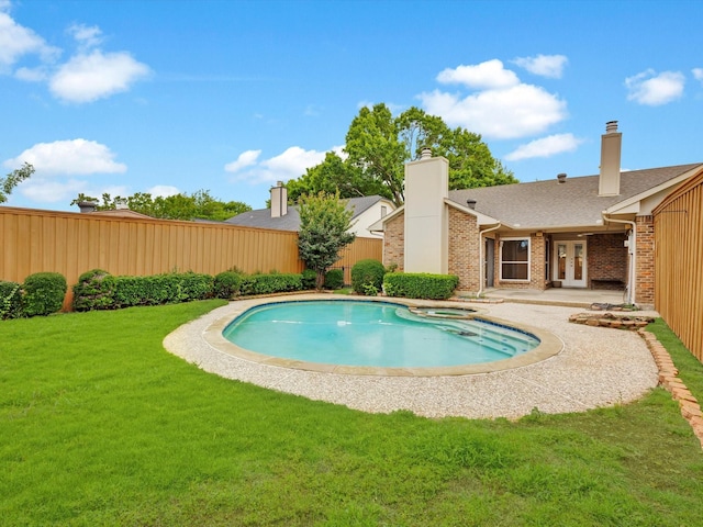 2024 Crestside Dr, Carrollton, TX 75007 - view of swimming pool featuring french doors and a pool with connected hot tub
