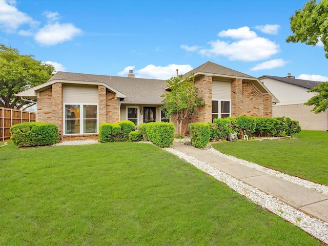 2024 Crestside Dr, Carrollton, TX 75007 - view of front of home featuring brick siding, a shingled roof, and a chimney