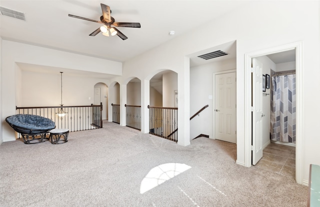 14209 Signal Hill Dr, Little Elm, TX 75068 - sitting room featuring ceiling fan, visible vents, carpet, and an upstairs landing