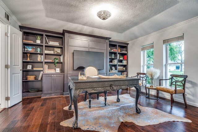 office space featuring a textured ceiling, visible vents, baseboards, dark wood-style flooring, and ornamental molding
