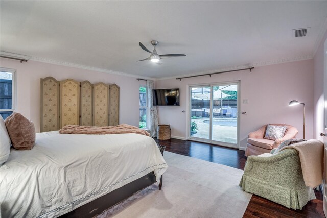 bedroom with crown molding, visible vents, access to outside, and wood finished floors