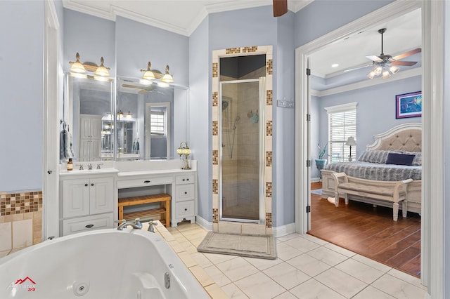 ensuite bathroom featuring connected bathroom, crown molding, a ceiling fan, a tub with jets, and a stall shower