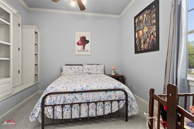 bedroom with crown molding, baseboards, ceiling fan, and carpet