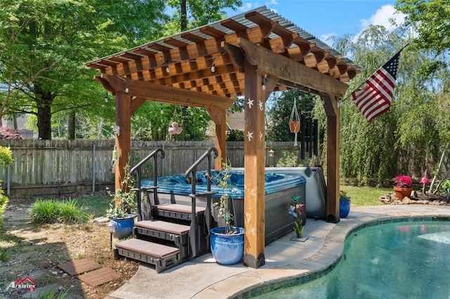 view of pool featuring a pergola, a fenced in pool, a jacuzzi, and a fenced backyard