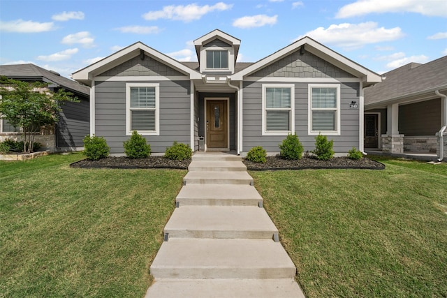 view of front facade with a front lawn
