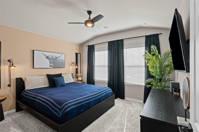 bedroom with a ceiling fan, carpet floors, lofted ceiling, and baseboards