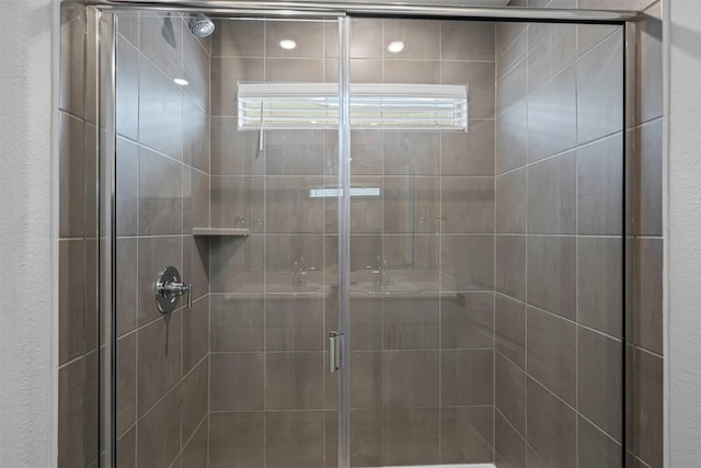 bathroom with a stall shower