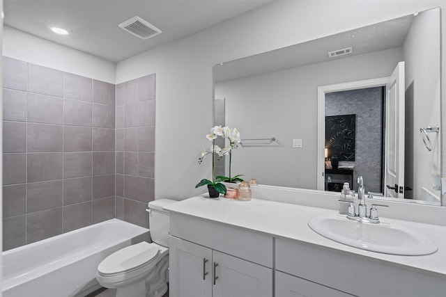 bathroom featuring toilet, visible vents, bathtub / shower combination, and vanity