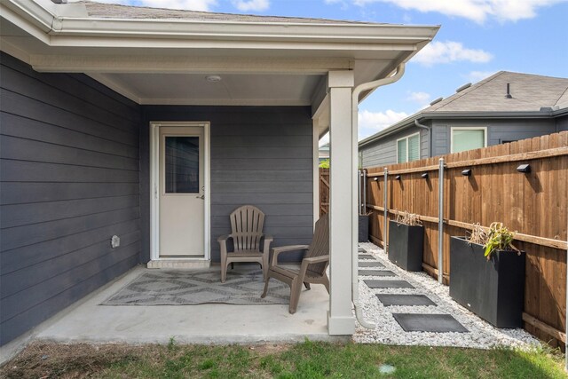 view of patio with fence