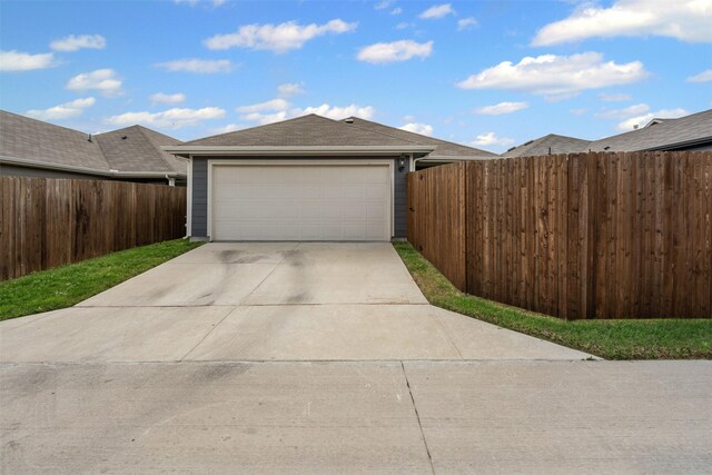 garage with fence