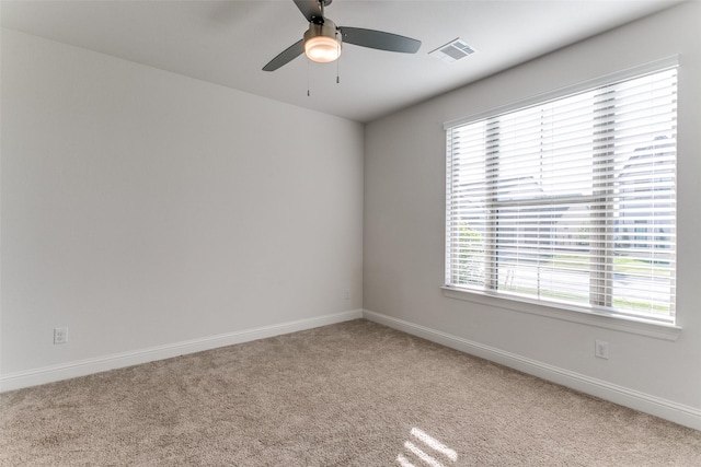 12492 Palmer Dr, Fort Worth, TX 76179 - carpeted spare room with visible vents, a ceiling fan, baseboards, and a wealth of natural light