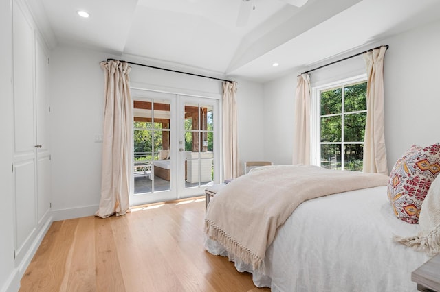 bedroom featuring french doors, recessed lighting, light wood finished floors, and access to exterior