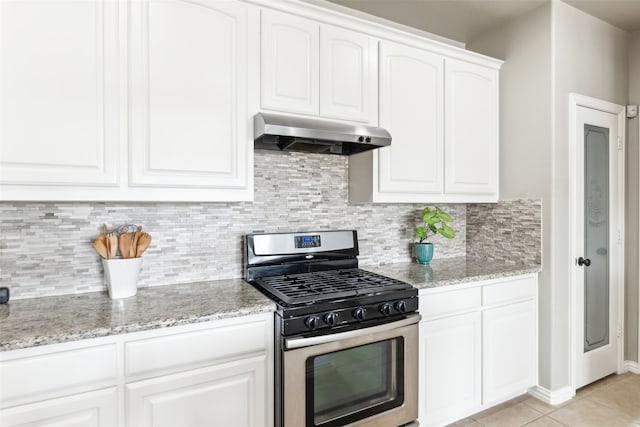 420 Westminster Dr, Lewisville, TX 75056 - kitchen featuring stainless steel range with gas stovetop, white cabinets, under cabinet range hood, and light stone counters