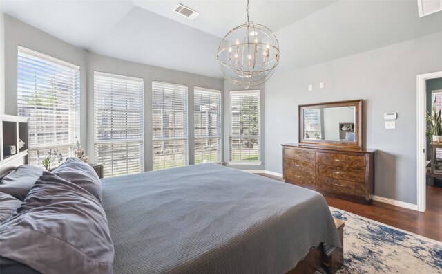 420 Westminster Dr, Lewisville, TX 75056 - bedroom featuring baseboards, multiple windows, visible vents, and a notable chandelier