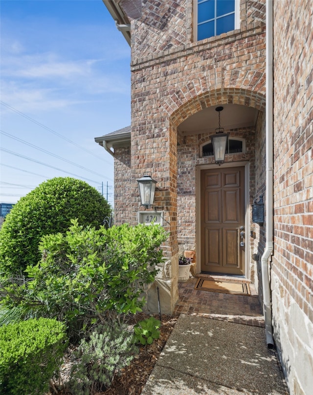 420 Westminster Dr, Lewisville, TX 75056 - view of exterior entry with brick siding