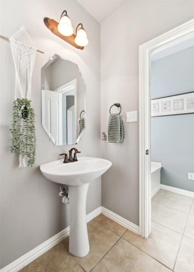 420 Westminster Dr, Lewisville, TX 75056 - bathroom featuring tile patterned floors and baseboards