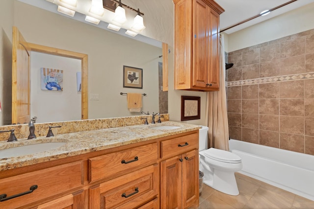 full bathroom with shower / bath combo, toilet, tile patterned flooring, and a sink