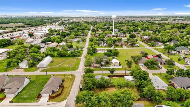 birds eye view of property with a residential view