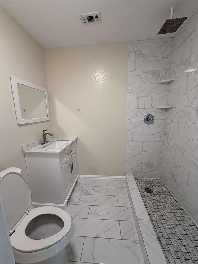 2726 Kellogg Ave, Dallas, TX 75216 - bathroom featuring tiled shower, marble finish floor, toilet, vanity, and visible vents