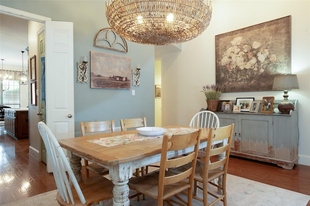 2621 Timberhollow Dr, Little Elm, TX 75068 - dining space featuring wood finished floors and a notable chandelier