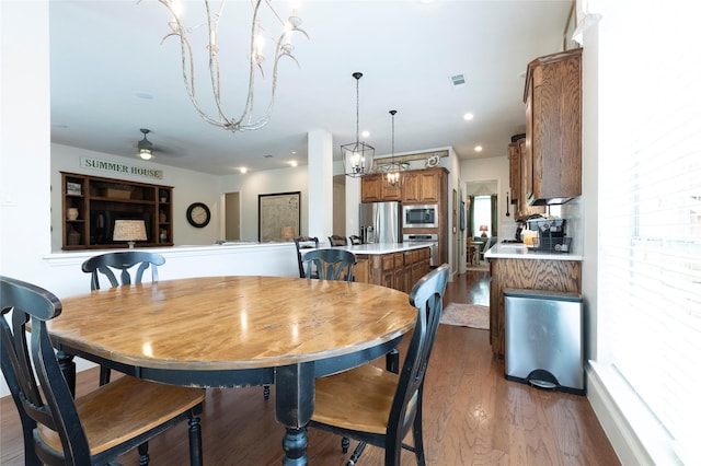 2621 Timberhollow Dr, Little Elm, TX 75068 - dining area featuring visible vents and dark wood-type flooring