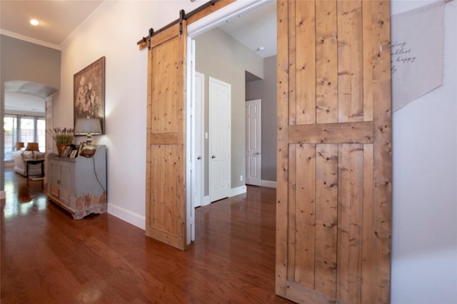 2621 Timberhollow Dr, Little Elm, TX 75068 - corridor featuring crown molding, baseboards, arched walkways, recessed lighting, and wood finished floors