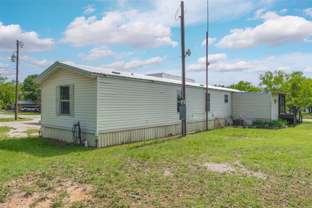 4991 Thunderbird Dr, May, TX 76857 - view of home's exterior featuring a yard