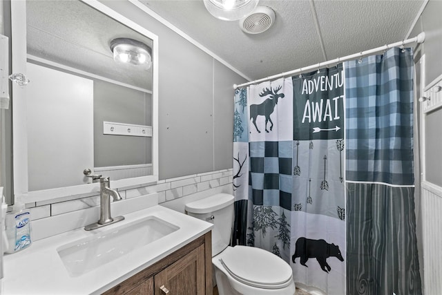 4991 Thunderbird Dr, May, TX 76857 - bathroom featuring vanity, toilet, visible vents, a textured ceiling, and a shower with shower curtain
