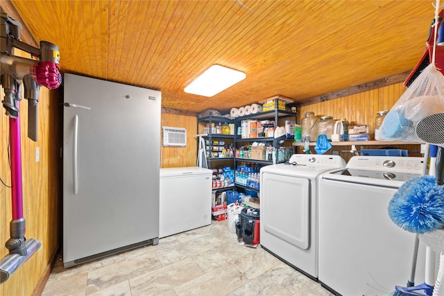4991 Thunderbird Dr, May, TX 76857 - washroom featuring wooden ceiling, wooden walls, laundry area, and washing machine and dryer