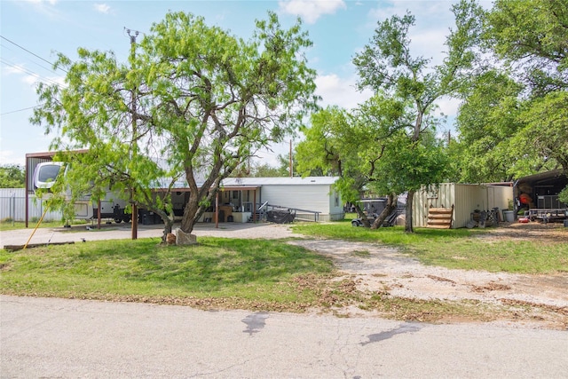 4991 Thunderbird Dr, May, TX 76857 - view of front of property with a front yard