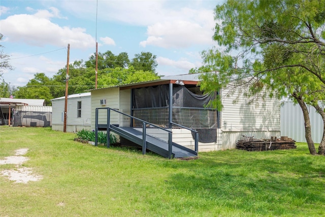 4991 Thunderbird Dr, May, TX 76857 - rear view of house with a yard