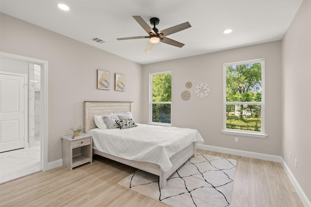 206 Splitrail Dr, Mabank, TX 75143 - bedroom featuring visible vents, ensuite bathroom, baseboards, light wood-type flooring, and recessed lighting