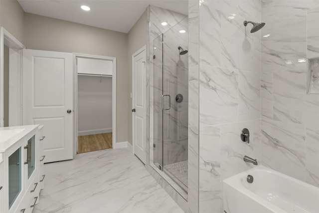 206 Splitrail Dr, Mabank, TX 75143 - full bathroom with a bath, a marble finish shower, marble finish floor, and a spacious closet