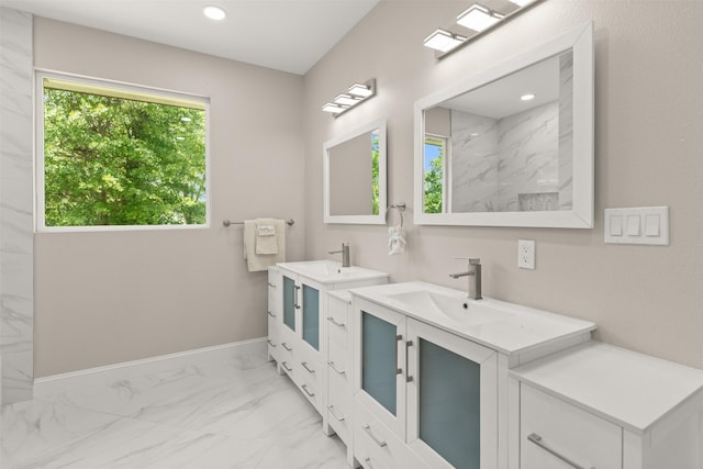 206 Splitrail Dr, Mabank, TX 75143 - full bathroom with a sink, baseboards, a marble finish shower, two vanities, and marble finish floor