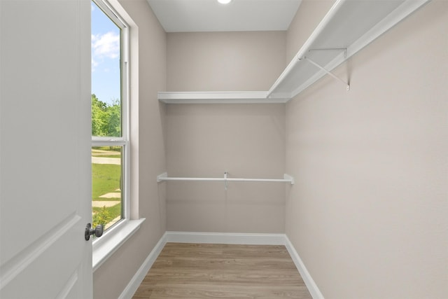 206 Splitrail Dr, Mabank, TX 75143 - walk in closet featuring wood finished floors