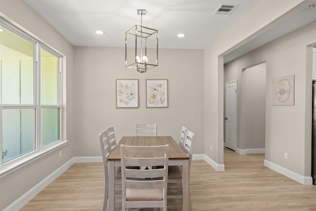 206 Splitrail Dr, Mabank, TX 75143 - dining area featuring visible vents, light wood-style floors, baseboards, recessed lighting, and a notable chandelier