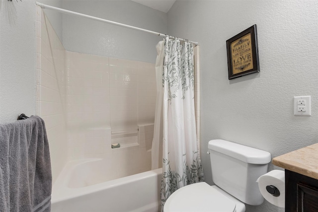 516 Celeste Dr, Robinson, TX 76706 - bathroom featuring a textured wall, shower / bath combo with shower curtain, and vanity
